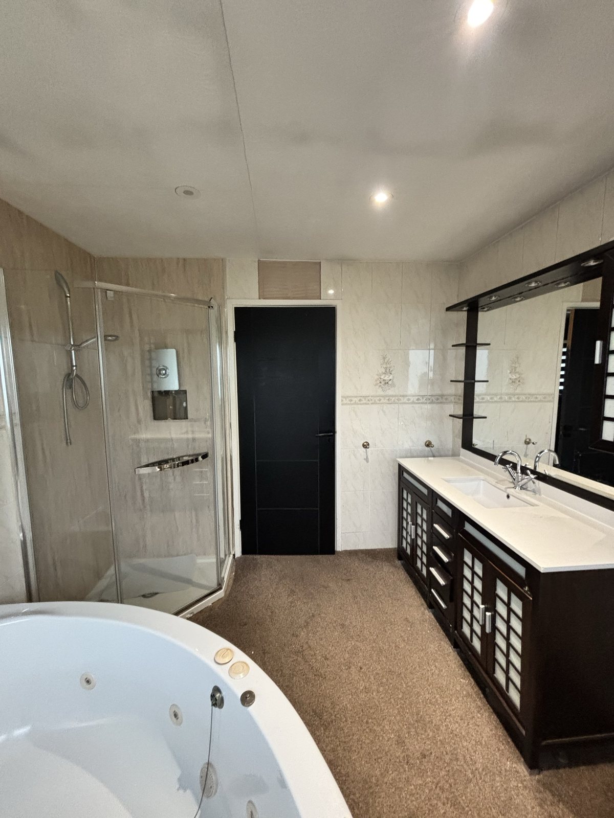 Ensuite before: dated vanity and shower, Whitefield